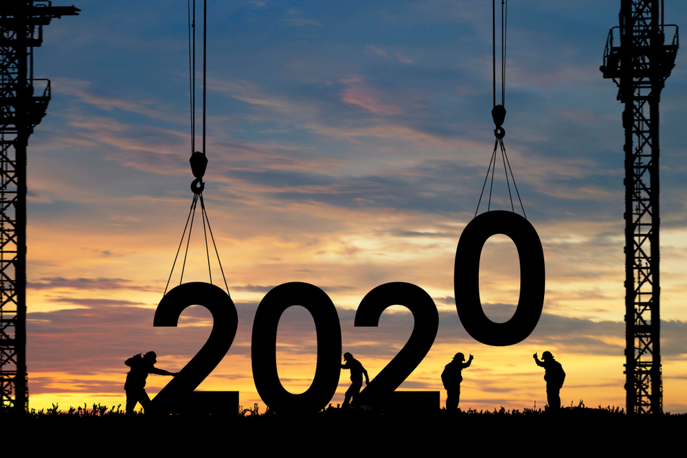 轮廓员工工作作为一个团队准备欢迎新2020年