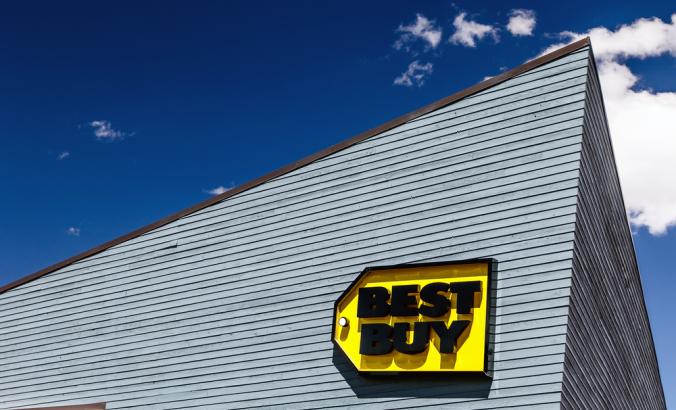 Bright sun lights up the sign on a Best Buy electronics store at Kimball Junction.