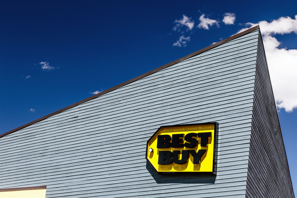 Bright sun lights up the sign on a Best Buy electronics store at Kimball Junction.